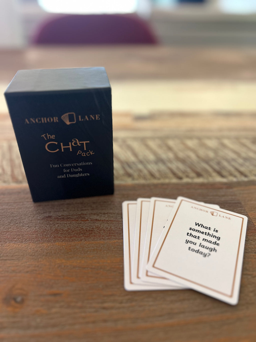 Anchor Lane Chat Pack conversation cards fanned out showing questions for dads and daughters
